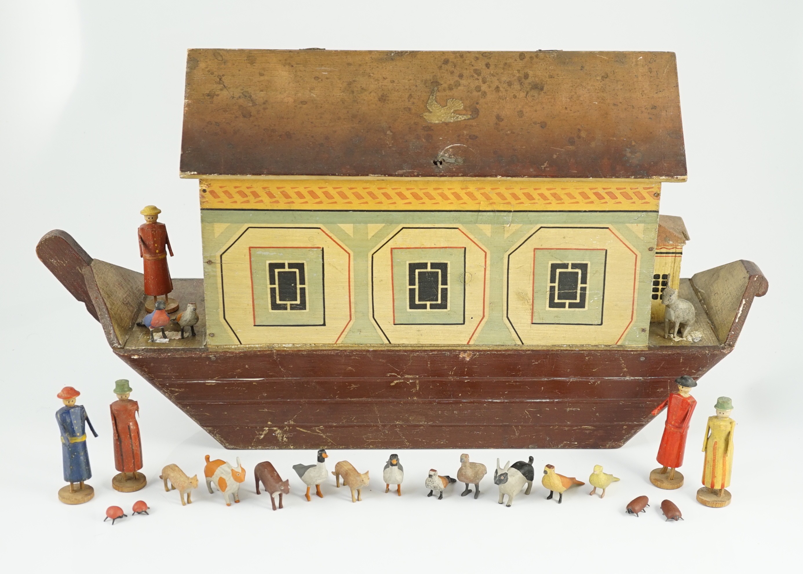 A late 19th century German painted wood Noah's Ark with 136 assorted figures and animals, 14cm wide, 54cm long, 30cm high, largest figure 8cm